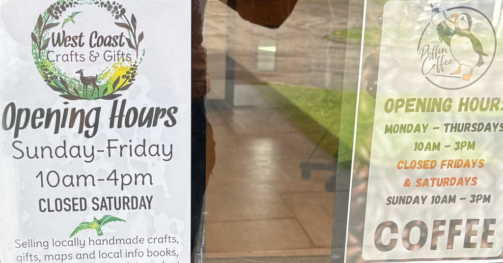 Opening times displayed on front door of community centre